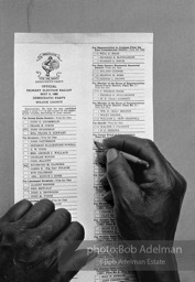 Making his mark, one of the first African Americans to cast a vote under the new law exercises his franchise,  Camden, Alabama.  1966