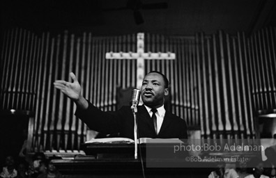 During a mass meeting at the 16th Street Baptist Church, King urges his supporters to join the demonstrations,  Birmingham,  Alabama.  1963
