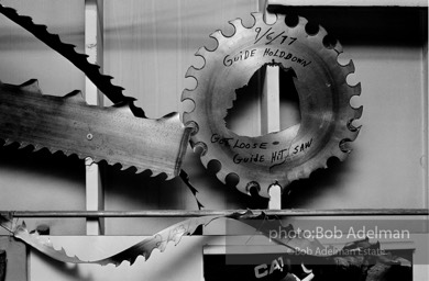 Ruined saw blades on the wall in the saw filer room at Boise-Cascade. (1989)
