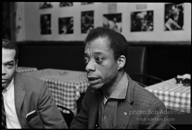 James Baldwin at Junior's Bar and Lounge on 52nd Street, during rehearsals for his play 'Blues for Mr. Charley'. New York City. 1964.
