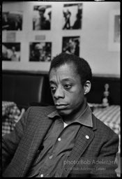 James Baldwin at Junior's Bar and Lounge on 52nd Street, during rehearsals for his play 'Blues for Mr. Charley'. New York City. 1964.