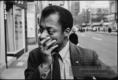 James Baldwin outside the ANTA Theater during the rehearsals for his play 'Blues For Mr. Charlie'. 1964.