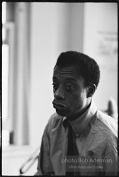 James Baldwin in the office area of his upper west side apartment at the time of production of his play 'Blues for Mr. Charlie'. 1964.