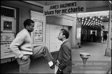 James Baldwin with civil rights activist, Jerome Smith, ouside the ANTA theater during the production of Baldwin's play 'Blues for Mr. Charlie. 1964.