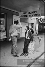 James Baldwin with civil rights activist, Jerome Smith, ouside the ANTA theater during the production of Baldwin's play 'Blues for Mr. Charlie. 1964.