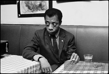 James Baldwin at Junior's Bar on 52nd Street during the rehearsals for his play 'Blues for Mr. Charlie' at the ANTA theater. 1964.