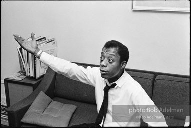James Baldwin in his Upper West Side apartment. New York City. 1964.