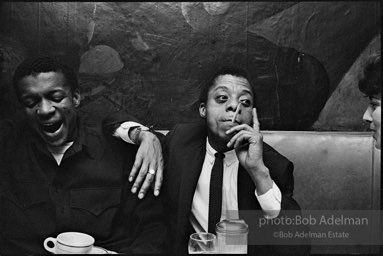 Jerome Smith and James Baldwin at El Toro's restaurant, New York City. 1964.