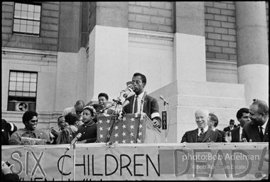 James Baldwin speaks at a memorial service for the four girls killed in Birmingham in the 16th Street Baptist
Church bombing, New York City.  1963