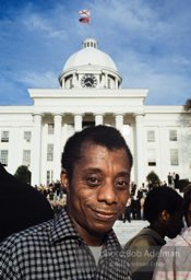 Jimmy Baldwin in front of the cradle of the Confederacy, Montgomery, Alabama, 1965