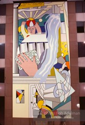 From Mural with Blue Brushstroke. New York City, 1985-86photo©Bob Adelman estate. Artwork©Estate of Roy Lichtenstein.