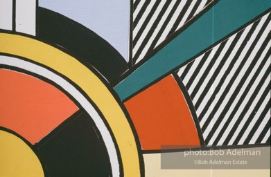 From Mural with Blue Brushstroke. New York City, 1985-86photo©Bob Adelman estate. Artwork©Estate of Roy Lichtenstein.