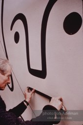 From Mural with Blue Brushstroke. New York City, 1985-86photo©Bob Adelman estate. Artwork©Estate of Roy Lichtenstein.