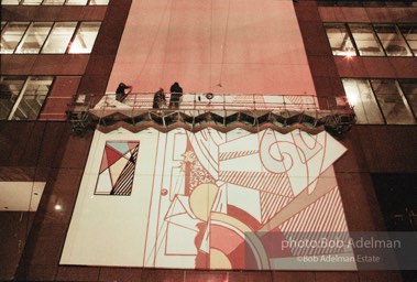 From Mural with Blue Brushstroke. New York City, 1985-86photo©Bob Adelman estate. Artwork©Estate of Roy Lichtenstein.
