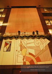 From Mural with Blue Brushstroke. New York City, 1985-86photo©Bob Adelman estate. Artwork©Estate of Roy Lichtenstein.