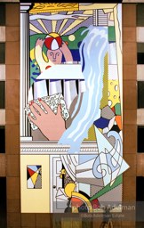 From Mural with Blue Brushstroke. New York City, 1985-86Roy Lichtenstein in front of the Mural With the Blue Brushstroke at the Equitable Building. NYC, 1985.photo©Bob Adelman estate. Artwork©Estate of Roy Lichtenstein.