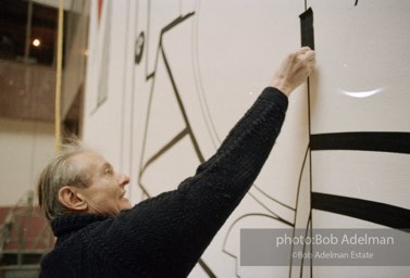 From Mural with Blue Brushstroke. New York City, 1985-86photo©Bob Adelman estate. Artwork©Estate of Roy Lichtenstein.