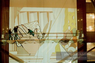 From Mural with Blue Brushstroke. New York City, 1985-86photo©Bob Adelman estate. Artwork©Estate of Roy Lichtenstein.