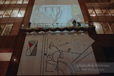 From Mural with Blue Brushstroke. New York City, 1985-86photo©Bob Adelman estate. Artwork©Estate of Roy Lichtenstein.