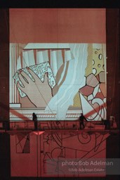 From Mural with Blue Brushstroke. New York City, 1985-86photo©Bob Adelman estate. Artwork©Estate of Roy Lichtenstein.