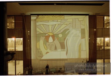 From Mural with Blue Brushstroke. New York City, 1985-86photo©Bob Adelman estate. Artwork©Estate of Roy Lichtenstein.