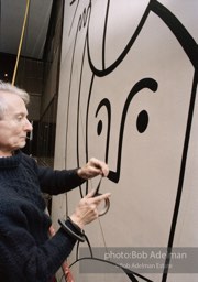 From Mural with Blue Brushstroke. New York City, 1985-86photo©Bob Adelman estate. Artwork©Estate of Roy Lichtenstein.
