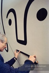 From Mural with Blue Brushstroke. New York City, 1985-86photo©Bob Adelman estate. Artwork©Estate of Roy Lichtenstein.