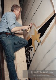 From Mural with Blue Brushstroke. New York City, 1985-86photo©Bob Adelman estate. Artwork©Estate of Roy Lichtenstein.
