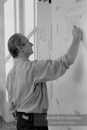 From Mural with Blue Brushstroke. New York City, 1985-86photo©Bob Adelman estate. Artwork©Estate of Roy Lichtenstein.