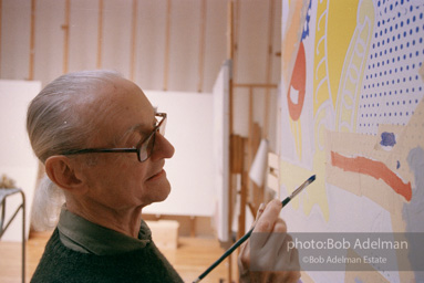 Roy Lichtenstein at work on his painting Interior with Ajax. 1997.-photo©Bob Adelman, artwork ©Estate of Roy Lichtenstein