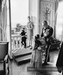 Princess Grace and Prince Rainier get ready to greet their subjects, 1963.