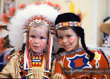 Encouraged by their mother, Prince Albert and Princess Caroline dress up as American Indians, Monaco,1962.