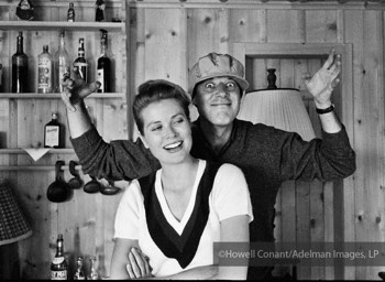 Howell mugs behind Princess Grace in Switzerland, 1959 - Grace Kelly with photographer Howell Conant. Switzerland, 1959.