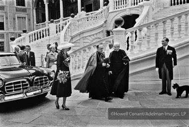 Escorted into the royal courtyard of the palace, Grace and her mother follow Monsignor Gilles Barthe, Bishop of Monaco, who would perform the wedding ceremony, and Father Francis Tucker, who Rainier often referred to as their cupid. Monaco, April 12, 1956.