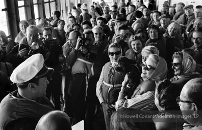 Grace Kelly with fellow passengers during the Muster Drill as the Constitution prepares to set sail. April, 1956.
