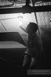 Robert Rauschenberg at a party at his loft, New York City. 1966