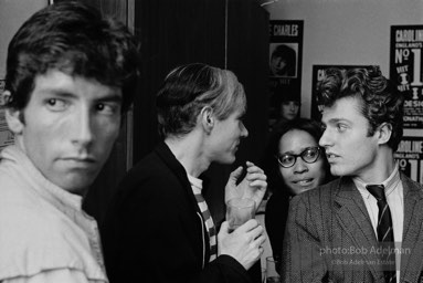 Andy Warhol and talks with Gerard Malanga at a discoteque, NYC, 1965.Parties-Nightclub