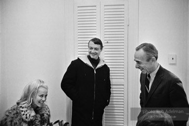 Roy Lichtenstein (center) and Leo Castelli share a laugh with art collector Holly Solomon in Leo Castelli's office, New York City, 1966.