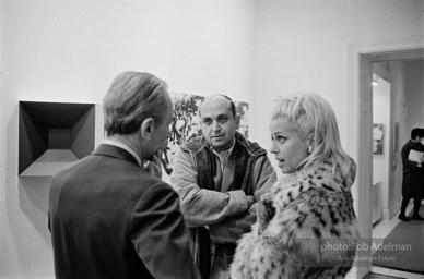 Leo Castelli with Holly Soloman, art dealer, at the Leo Castelli Gallery, NYC, 1965.