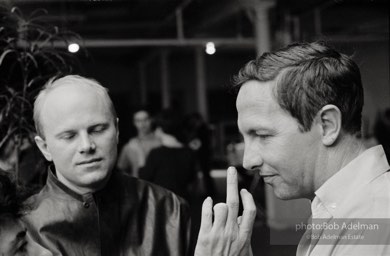 Robert Rauschenberg and James Rosenquist at a party at Rauschenberg's loft. New York City, 1966