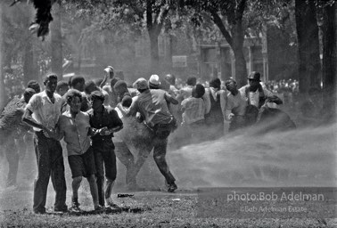 Beloved community, Kelly Ingram Park, Birmingham, Alabama.  1963


“‘If you don’t bear the cross, you can’t wear the crown’ was the loving spirit that animated the Movement. In Birmingham, the protestors clearly earned their crowns. The use of fire hoses and dogs backfired. City officials lost control of themselves, of the protests and of segregation. What happened in Birmingham provoked John Kennedy to denounce segregation — the first U.S. president to do so —  and to urge its legal ban. The drama that unfolded in Birmingham proved to be a triumphant moment for the ideals of non-violent social change.”
