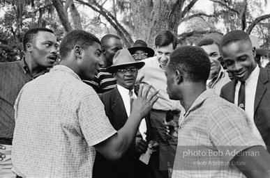 Neighbors and civil rights workers gather to congratulate Carter and hear about his historic breakthrough, West Feliciana Parish, Louisiana.  1964