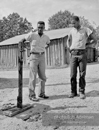 Burned cross: In response to the Reverend Joe Carter’s efforts to register and vote, Klansmen attempt to intimidate local blacks, West Feliciana Parish, Louisiana.  1964