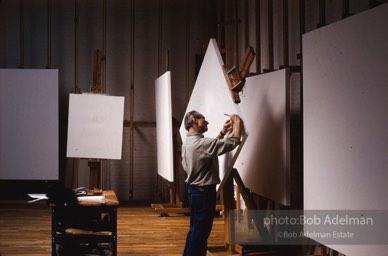 Roy Lichtenstein begins work on his Reflections series of paintings. 1989 photo:©Bob Adelman Estate, Artwork©Estate of Roy Lichtenstein