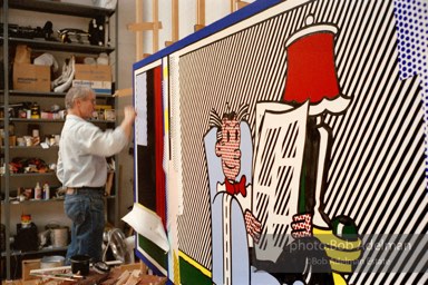 Roy Lichtenstein finishing his painting 'Reflections: Sunday Morning'. 1989 photo:©Bob Adelman Estate, Artwork©Estate of Roy Lichtenstein