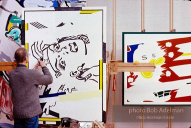 Roy Lichtenstein at work on his painting 'Reflections:Wonder Woman- (Laocoon and Portrait of a Duck in background). 1989. photo:©Bob Adelman Estate, Artwork©Estate of Roy Lichtenstein